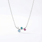 Ssoftly Lyra color drop necklace in rhodium-plated recycled brass with three cubic zirconia stones and pearl detail, adjustable 38-42 cm, Korean jewelry